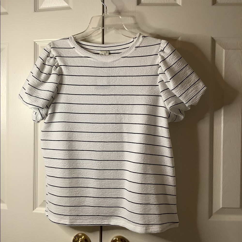 Black and white stripped shirt from a boutique. Puffy sleeves size medium